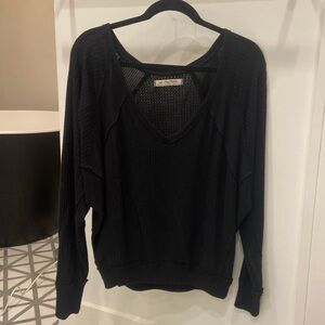 Free people black shirt in extra small. Worn but I’m very good condition.